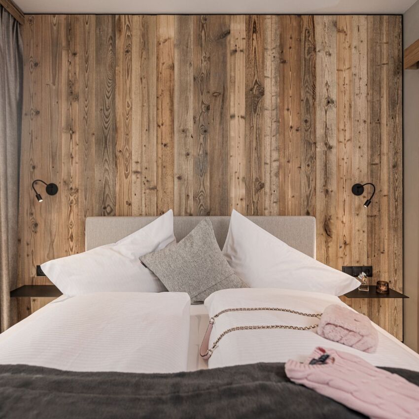 Doppelbett im Apartment Penken im Schrofenblick Alpen Resort