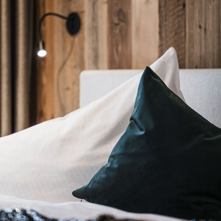 Doppelbett im Apartment Penken im Schrofenblick Alpen Resort