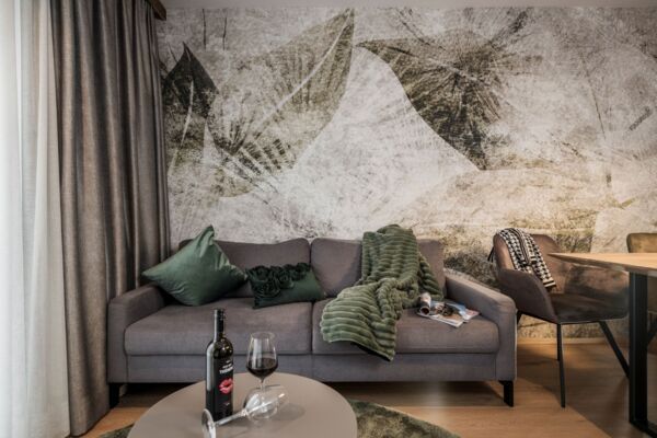 Wohnbereich im Apartment Penken im Schrofenblick Alpen Resort